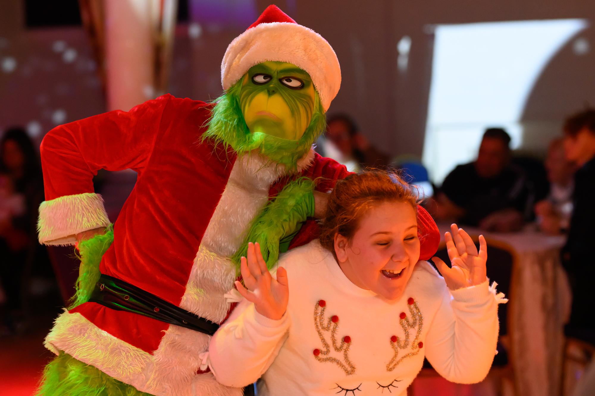 The Grinch visiting Cloch's Christmas Celebration